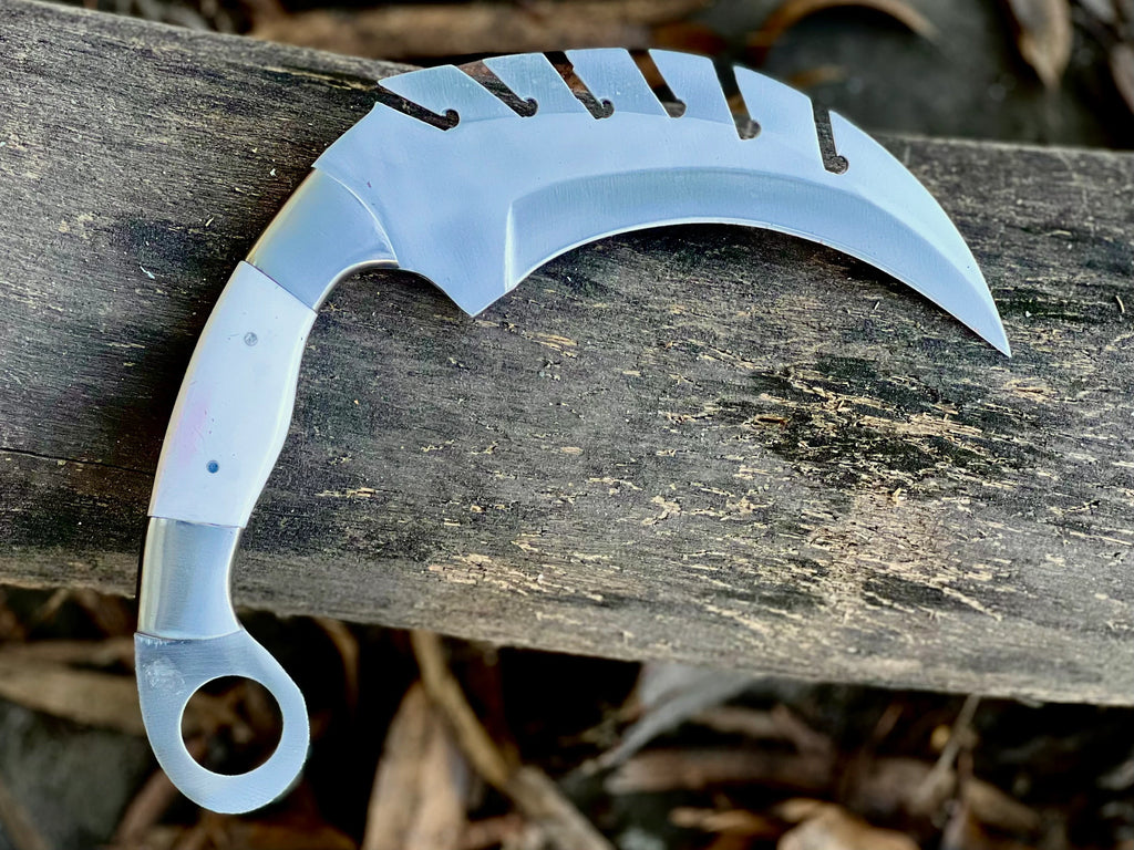 Forged saw-tooth karambit knife with camel bone and buffalo horn handles
