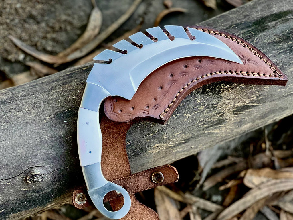 Forged saw-tooth karambit knife with camel bone and buffalo horn handles