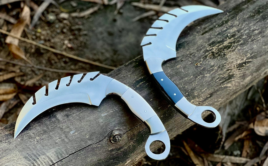 Forged saw-tooth karambit knife with camel bone and buffalo horn handles