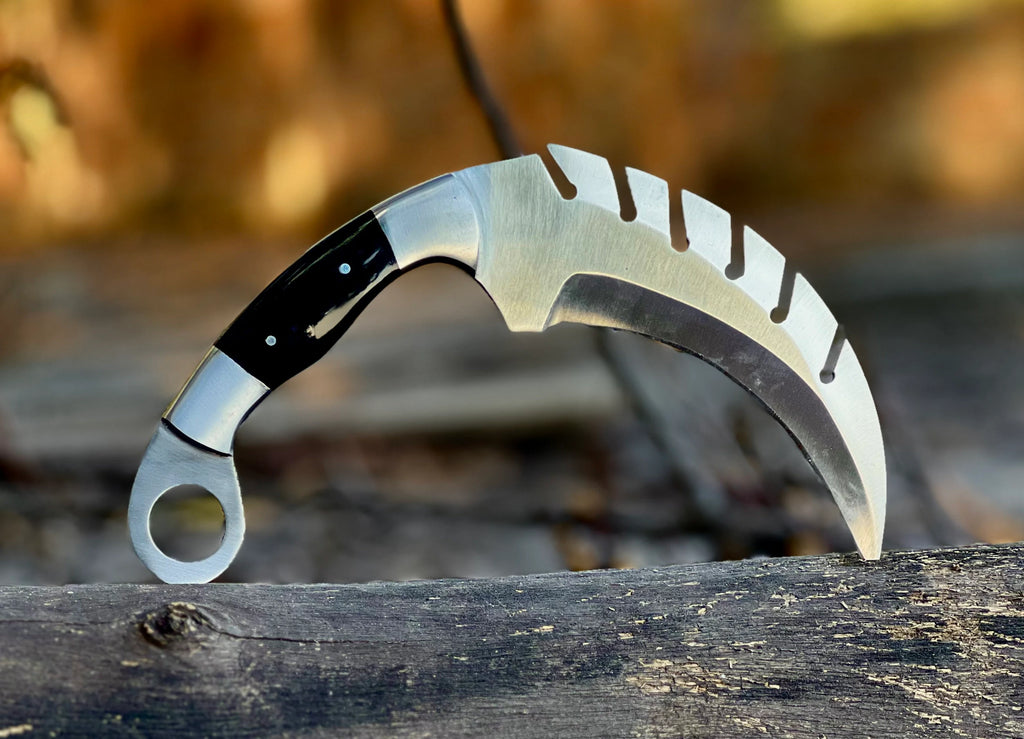 Forged saw-tooth karambit knife with camel bone and buffalo horn handles