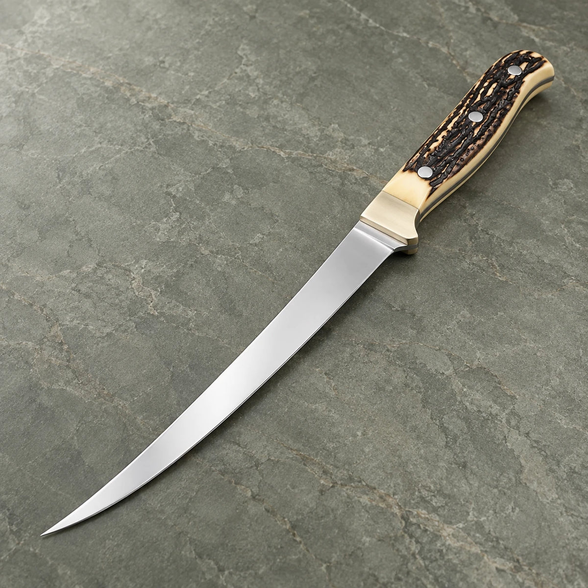 Flexible stainless fillet knife with curved mirror-finish blade and stag handle